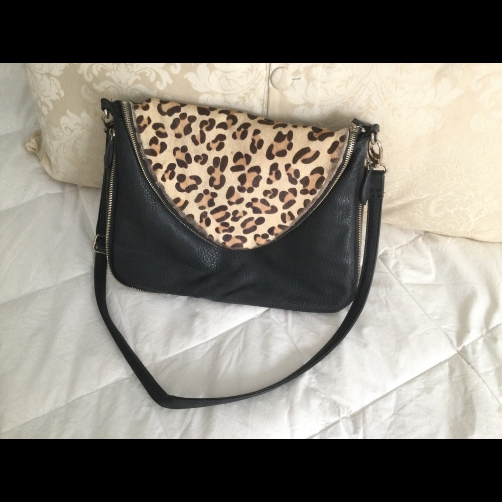 Fold over leopard accent handbag